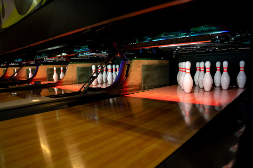 Organized pins at a bowling alley - sports and recreation concepts
