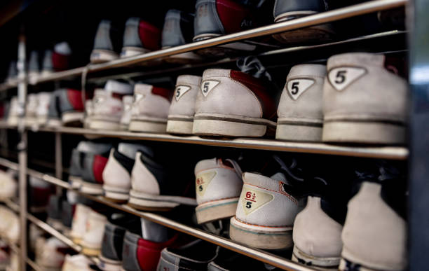 Close-up on bowling shoes for rent at the alley - sports and recreationg concepts