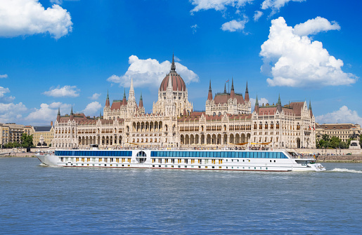 .Hungary, boat cruise near panoramic view and city skyline of Budapest historic center.