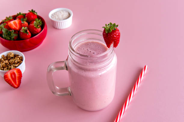 Strawberry smoothie cup, healthy shake of strawberry with milk.