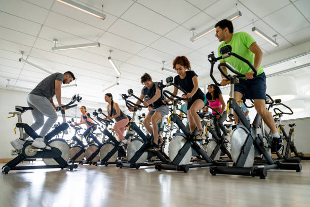 istock Group of people training at the gym in a exercising class 1411330438