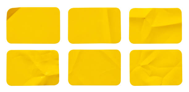 Yellow plastic sticker label isolated on white background