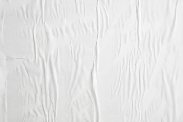 istock white crumpled and creased paper poster texture background 1411336757