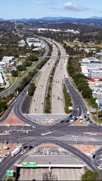 istock Busy Traffic Intersection And Overpass Shot From Above 1411340303