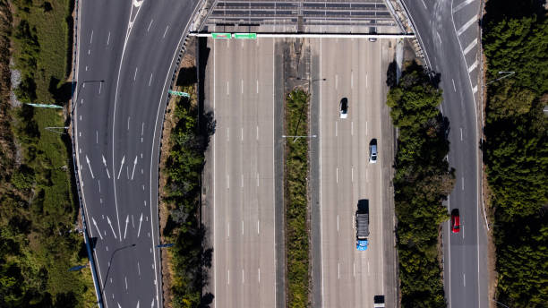 istock Busy Traffic Intersection And Overpass Shot From Above 1411340782