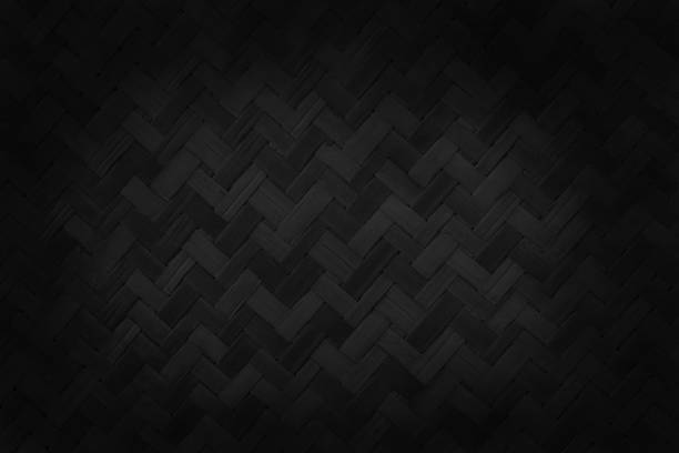 istock Old black bamboo weave texture background, pattern of woven rattan mat in vintage style. 1411346070