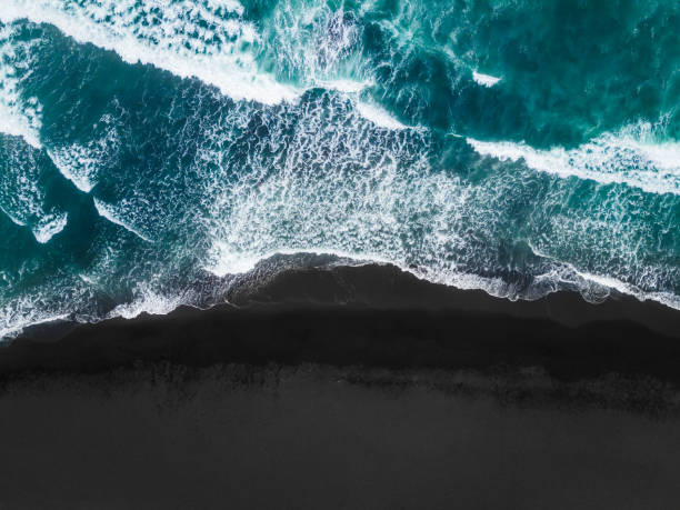 istock Pacific ocean coast with black volcanic sand in Kamchatka, Russia. 1411346619