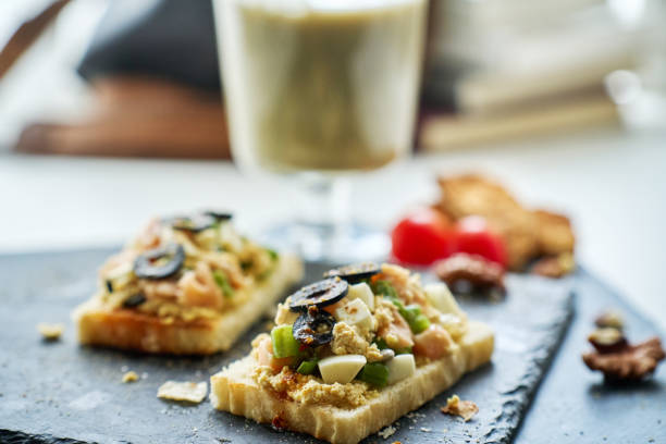 Brunch toast, with salmon, egg and black olive