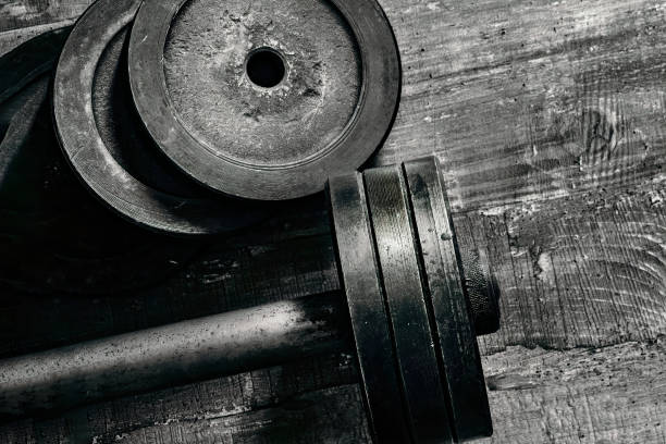 istock fitness equipment dumbbell barbell top view 1411350907