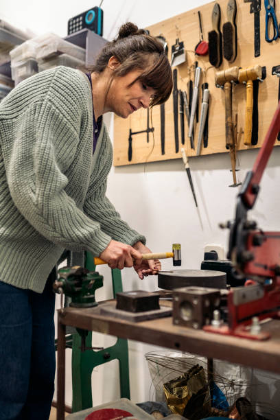 istock Woman Working in Artisan Workshop 1411351819