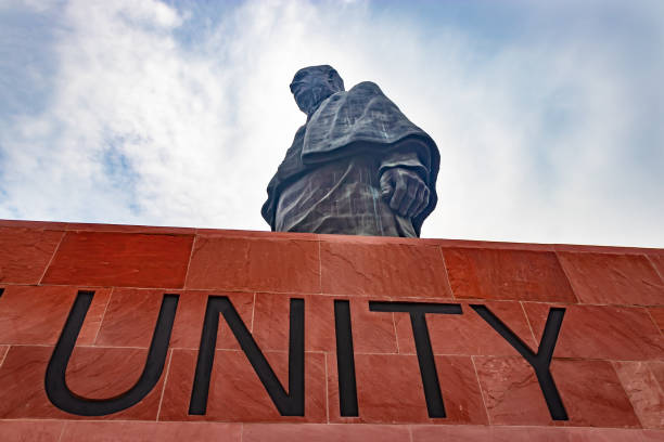 statue of unity the world tallest statue with bright dramatic sky at day from different angle statue of unity the world tallest statue with bright dramatic sky at day from different angle image is taken at vadodra gujrat india on July 10 2022. It was designed by Indian sculptor Ram V. Sutar and was inaugurated on 31 October 2018 National Unity Day india stock pictures, royalty-free photos & images