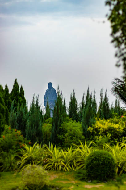 statue of unity the world tallest statue with bright dramatic sky at day from different angle image is taken at vadodra gujrat india on July 10 2022. It was designed by Indian sculptor Ram V. Sutar and was inaugurated on 31 October 2018