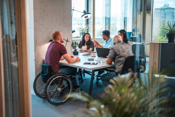 istock Focused Business People Brainstorming at Meeting 1411362695