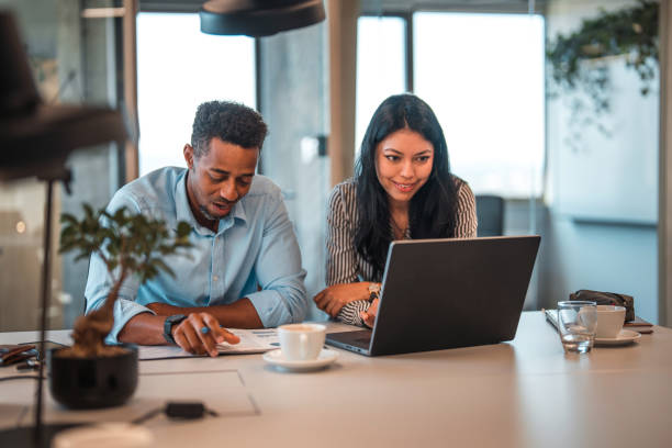 istock Effective Male Manager and Female Intern Communication 1411362725