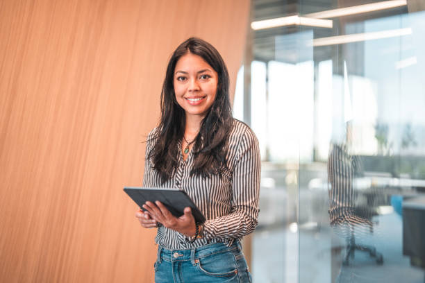 istock Latin Entrepreneur Holding a Digital Tablet 1411362743