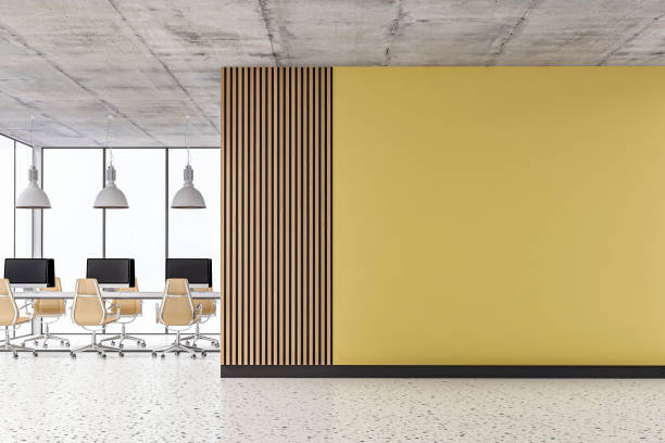 istock Empty office interior with copy space and work desks on terrazzo floor and paneled wall 1411365458