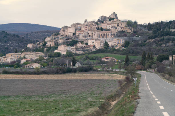 istock Simiane la Rotonde  from the road below 1411369382
