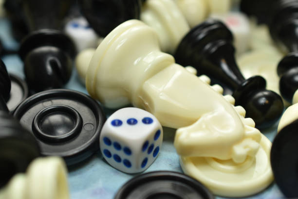 istock Chess piece horse and dice on the table. 1411371992