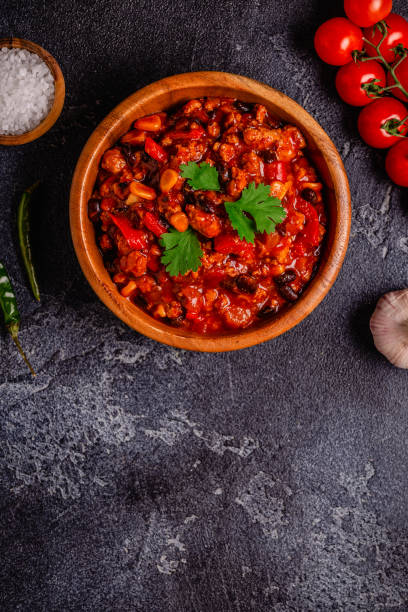 istock Chili Con Carne in bowl on dark background. 1411373346