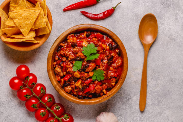 istock Chili Con Carne in bowl on grey background. 1411373616