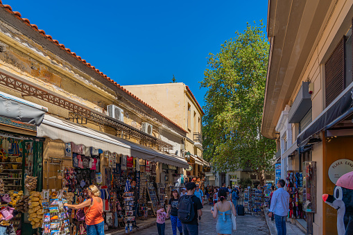 ATHENS, GREECE - MAY 21, 2022: Street view in Plaka district of Athens at the shopping street