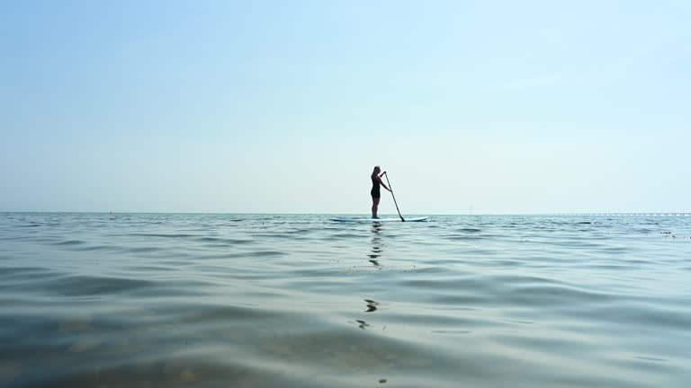 Woman on paddle board