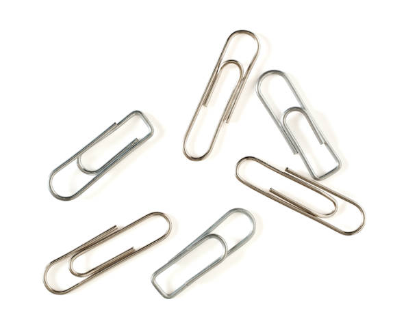 Paper clips on white background isolated, paperclips, silver, metal paper clip stock pictures, royalty-free photos & images