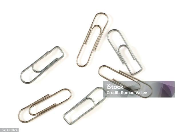 Paper Clips On White Background Stock Photo - Download Image Now - Paper Clip, Cut Out, White Background