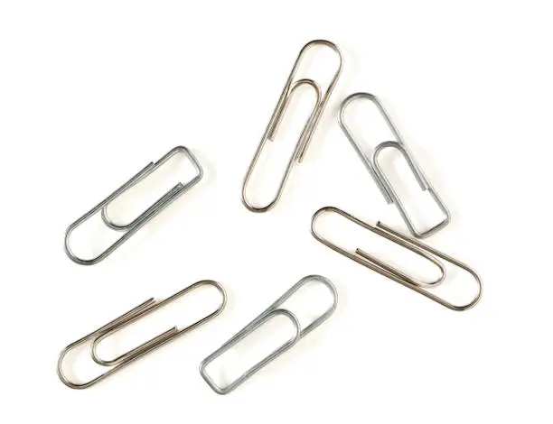 Photo of Paper clips on white background