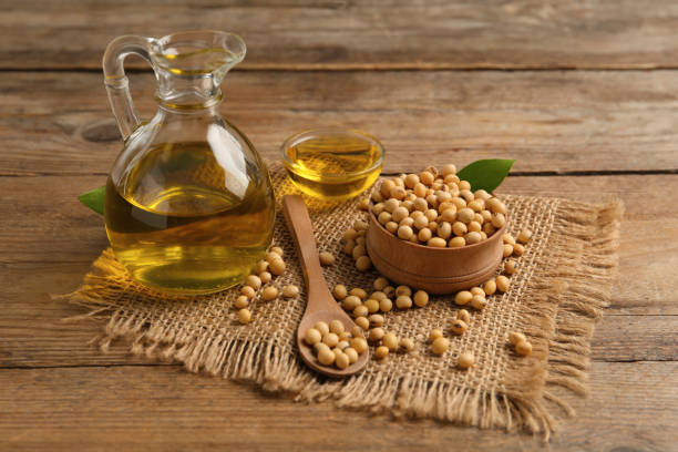istock Composition with soybean oil on wooden table 1411382167