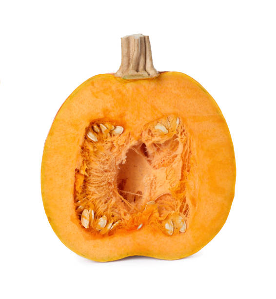 istock Half of fresh ripe pumpkin isolated on white 1411382736