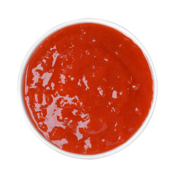 istock Delicious rowan jam in bowl on white background, top view 1411383763
