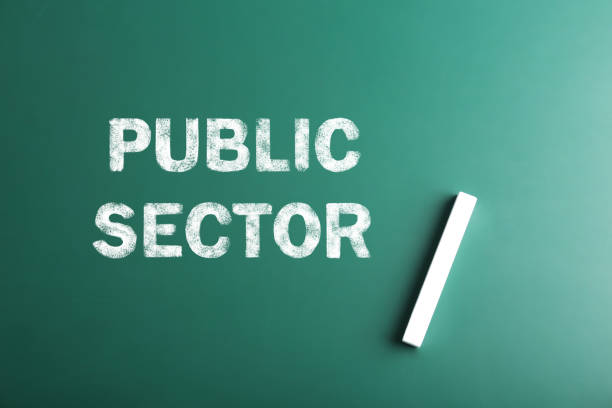 istock Phrase Public Sector written on green chalkboard, top view 1411384883