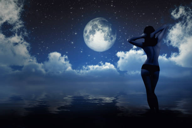 istock girl in moonlight 1411386691