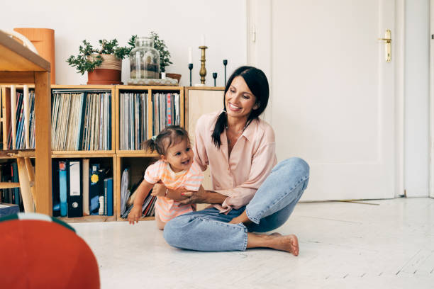 istock Mother And Her Daughter Playing 1411388058