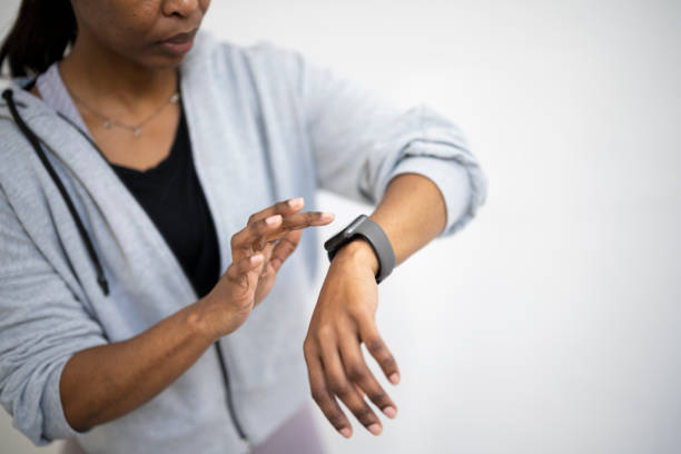 istock Part of woman using smart watch 1411395150