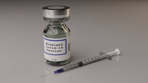Bivalent Covid-19 vaccine vial and syringe Single bivalent covid-19 vaccine vial and syringe sars cov 2 delta variant stock pictures, royalty-free photos & images