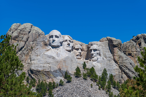 Mount Rushmore National Memorial depicts the U.S. presidents George Washington, Thomas Jefferson, Theodore Roosevelt and Abraham Lincoln are carved into Mount Rushmore in the Black Hills.