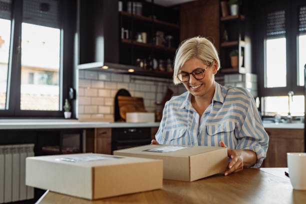 istock Young woman just got a delivery 1411397931