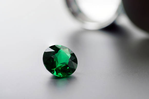 istock raw emeralds, gemstone jewelry on black background 1411397958