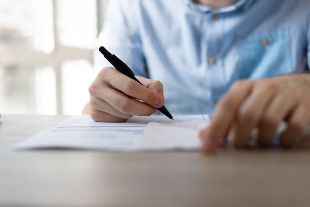 istock Man signing contract. Close up. Deal concept 1411399551