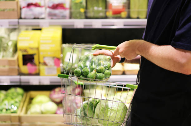 istock buying vegetables  at the market 1411404031