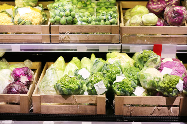 istock buying cabbage  at the market 1411404033