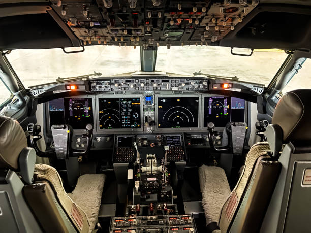 Aircraft cockpit of Boeing 737 800 Max Aircraft cockpit of Boeing 737 800 Max view with on indicator and instrument after maintenance cockpit stock pictures, royalty-free photos & images