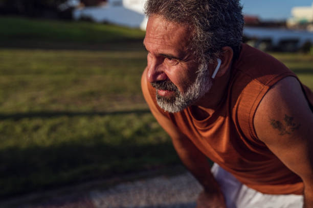 istock Elderly man preparing for an afternoon run 1411410724