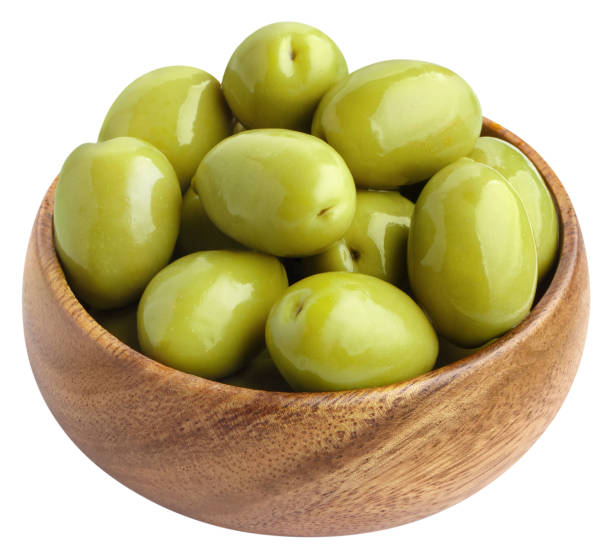 istock Wooden bowl with green olives on white 1411412992