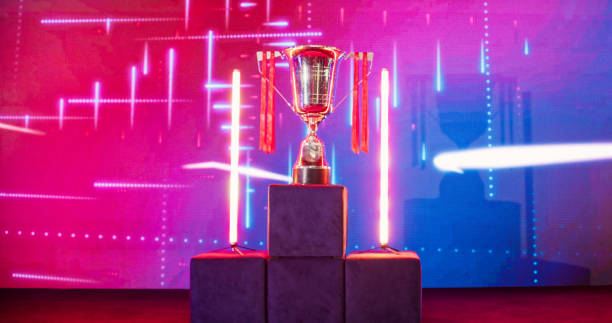 istock Video game eSport championship trophy on stage 1411414293