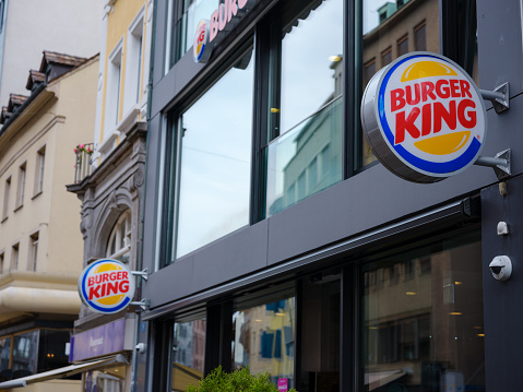Basel, Switzerland - July 4 2022: Burger King Restaurant logo. Burger King, founded in 1954, claims to serve more than 11 million guests per day around the world. in swiss city
