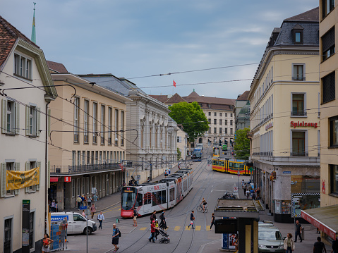 Basel, Switzerland - July 4 2022: public transport in the city. tram in street of Basel city center. Basel's trams have become an inseparable part of the cityscape.