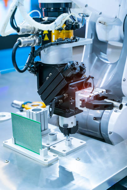 istock industrial robotic arm manipulator, Manufacturing, engineering, futuristic, ai, technology concept 1411423601